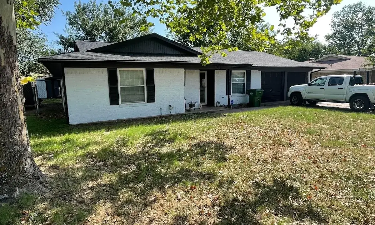 Professional roofing crew working on a residential roof in Kendale Lakes